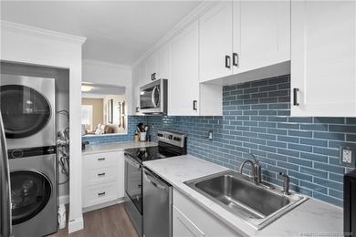 Fully renovated with quality finishes, this light and bright 1 on Miles Grant Country Club in Florida - for sale on GolfHomes.com, golf home, golf lot