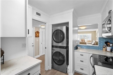 Fully renovated with quality finishes, this light and bright 1 on Miles Grant Country Club in Florida - for sale on GolfHomes.com, golf home, golf lot