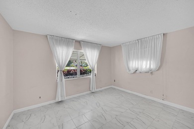 Lovely Corner Leisureville Home (55+) located just east of on Leisureville Community Golf Course in Florida - for sale on GolfHomes.com, golf home, golf lot