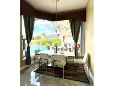 Located behind the prestigious guard-gated entrances of Eagle on TPC Eagle Trace in Florida - for sale on GolfHomes.com, golf home, golf lot