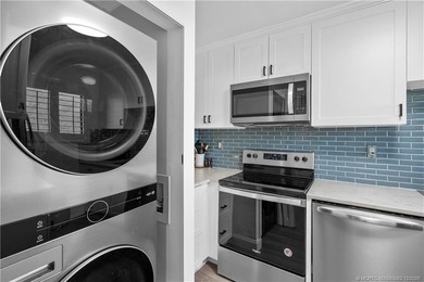 Fully renovated with quality finishes, this light and bright 1 on Miles Grant Country Club in Florida - for sale on GolfHomes.com, golf home, golf lot