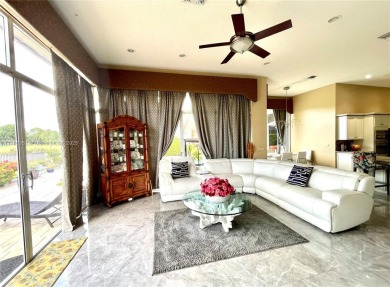 Located behind the prestigious guard-gated entrances of Eagle on TPC Eagle Trace in Florida - for sale on GolfHomes.com, golf home, golf lot