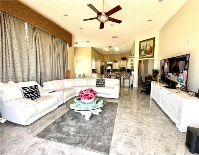 Located behind the prestigious guard-gated entrances of Eagle on TPC Eagle Trace in Florida - for sale on GolfHomes.com, golf home, golf lot