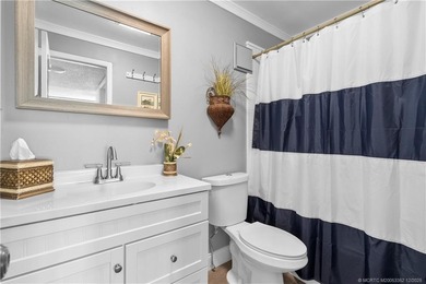 Fully renovated with quality finishes, this light and bright 1 on Miles Grant Country Club in Florida - for sale on GolfHomes.com, golf home, golf lot