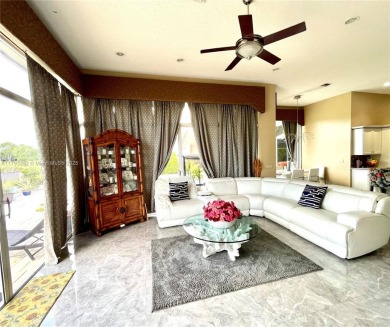 Located behind the prestigious guard-gated entrances of Eagle on TPC Eagle Trace in Florida - for sale on GolfHomes.com, golf home, golf lot