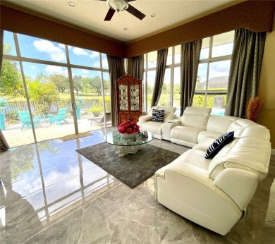 Located behind the prestigious guard-gated entrances of Eagle on TPC Eagle Trace in Florida - for sale on GolfHomes.com, golf home, golf lot