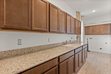 Welcome to 17708 Sawgrass Run, a stunning 2023-built luxury home on Deer Island Country Club in Florida - for sale on GolfHomes.com, golf home, golf lot