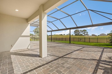 Welcome to 17708 Sawgrass Run, a stunning 2023-built luxury home on Deer Island Country Club in Florida - for sale on GolfHomes.com, golf home, golf lot