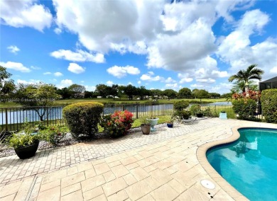 Located behind the prestigious guard-gated entrances of Eagle on TPC Eagle Trace in Florida - for sale on GolfHomes.com, golf home, golf lot