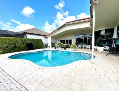 Located behind the prestigious guard-gated entrances of Eagle on TPC Eagle Trace in Florida - for sale on GolfHomes.com, golf home, golf lot