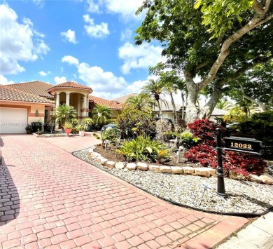 Located behind the prestigious guard-gated entrances of Eagle on TPC Eagle Trace in Florida - for sale on GolfHomes.com, golf home, golf lot