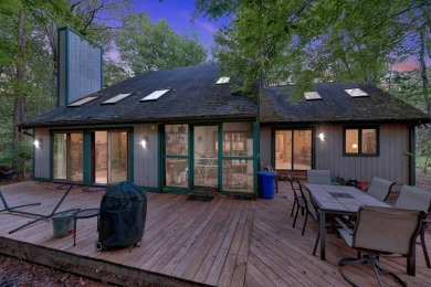 This spacious 4 bedroom, 3 bath home is located in the highly on Lake Naomi Timber Trails Golf Club in Pennsylvania - for sale on GolfHomes.com, golf home, golf lot