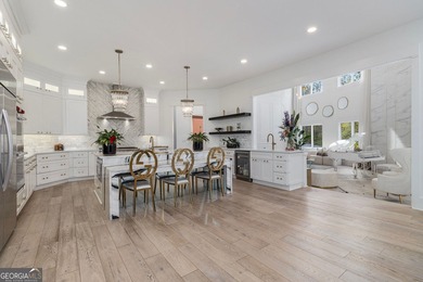 The home of your dreams awaits you! Discover this prestigious on Country Club of the South in Georgia - for sale on GolfHomes.com, golf home, golf lot