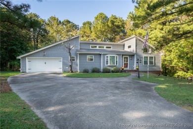 Discover this stunning 1600+ sqft, 3-bedroom, 2-bathroom home on Carolina Lakes Country Club in North Carolina - for sale on GolfHomes.com, golf home, golf lot