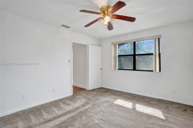 Come view this 2 bedroom 2 bathroom condo in the heart of on Pembroke Lakes Golf Club in Florida - for sale on GolfHomes.com, golf home, golf lot