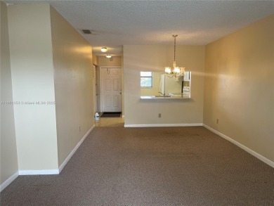 Discover serene living in this charming 2 bed, 2 bath condo on Pembroke Lakes Golf Club in Florida - for sale on GolfHomes.com, golf home, golf lot