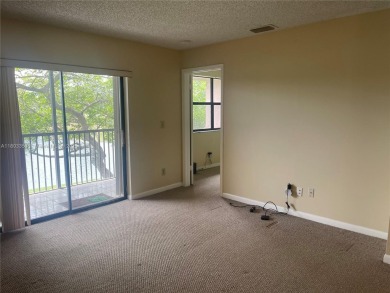 Discover serene living in this charming 2 bed, 2 bath condo on Pembroke Lakes Golf Club in Florida - for sale on GolfHomes.com, golf home, golf lot