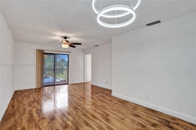 Come view this 2 bedroom 2 bathroom condo in the heart of on Pembroke Lakes Golf Club in Florida - for sale on GolfHomes.com, golf home, golf lot