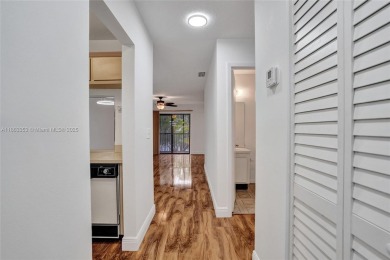 Come view this 2 bedroom 2 bathroom condo in the heart of on Pembroke Lakes Golf Club in Florida - for sale on GolfHomes.com, golf home, golf lot
