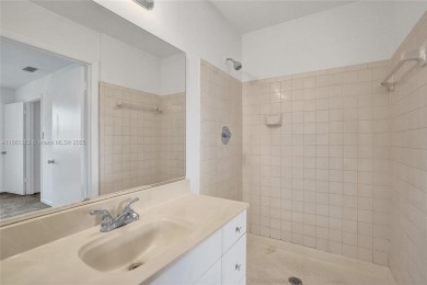 Come view this 2 bedroom 2 bathroom condo in the heart of on Pembroke Lakes Golf Club in Florida - for sale on GolfHomes.com, golf home, golf lot