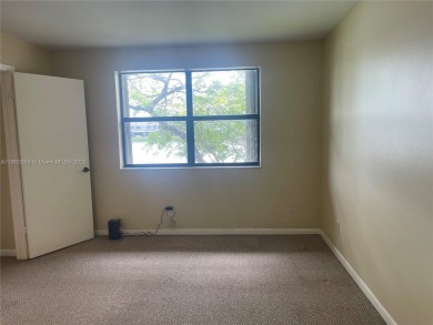 Discover serene living in this charming 2 bed, 2 bath condo on Pembroke Lakes Golf Club in Florida - for sale on GolfHomes.com, golf home, golf lot