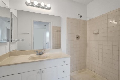 Come view this 2 bedroom 2 bathroom condo in the heart of on Pembroke Lakes Golf Club in Florida - for sale on GolfHomes.com, golf home, golf lot