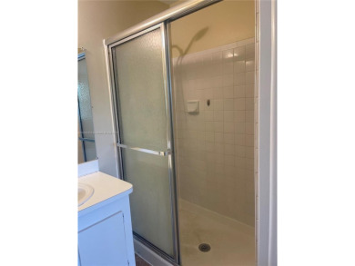 Discover serene living in this charming 2 bed, 2 bath condo on Pembroke Lakes Golf Club in Florida - for sale on GolfHomes.com, golf home, golf lot