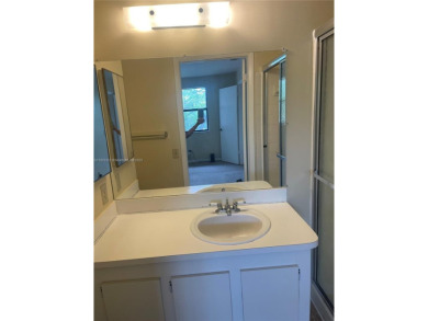 Discover serene living in this charming 2 bed, 2 bath condo on Pembroke Lakes Golf Club in Florida - for sale on GolfHomes.com, golf home, golf lot