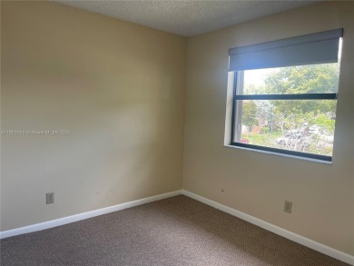 Discover serene living in this charming 2 bed, 2 bath condo on Pembroke Lakes Golf Club in Florida - for sale on GolfHomes.com, golf home, golf lot