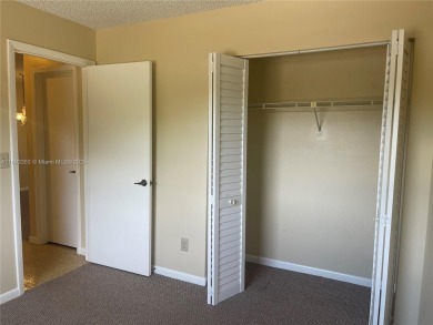 Discover serene living in this charming 2 bed, 2 bath condo on Pembroke Lakes Golf Club in Florida - for sale on GolfHomes.com, golf home, golf lot