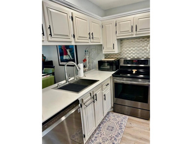 UNDOUBTEDLY THE NICEST 1/1 IN ALL OF WYNMOOR.  EXPANDED FLOOR on Wynmoor Golf Course in Florida - for sale on GolfHomes.com, golf home, golf lot