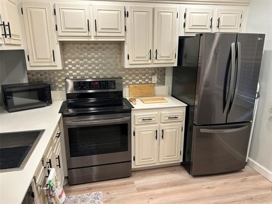 UNDOUBTEDLY THE NICEST 1/1 IN ALL OF WYNMOOR.  EXPANDED FLOOR on Wynmoor Golf Course in Florida - for sale on GolfHomes.com, golf home, golf lot