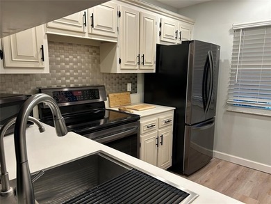 UNDOUBTEDLY THE NICEST 1/1 IN ALL OF WYNMOOR.  EXPANDED FLOOR on Wynmoor Golf Course in Florida - for sale on GolfHomes.com, golf home, golf lot