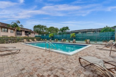 Come view this 2 bedroom 2 bathroom condo in the heart of on Pembroke Lakes Golf Club in Florida - for sale on GolfHomes.com, golf home, golf lot