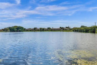 Come view this 2 bedroom 2 bathroom condo in the heart of on Pembroke Lakes Golf Club in Florida - for sale on GolfHomes.com, golf home, golf lot