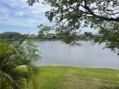 Discover serene living in this charming 2 bed, 2 bath condo on Pembroke Lakes Golf Club in Florida - for sale on GolfHomes.com, golf home, golf lot