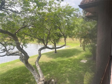 Discover serene living in this charming 2 bed, 2 bath condo on Pembroke Lakes Golf Club in Florida - for sale on GolfHomes.com, golf home, golf lot