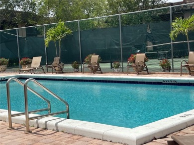 Discover serene living in this charming 2 bed, 2 bath condo on Pembroke Lakes Golf Club in Florida - for sale on GolfHomes.com, golf home, golf lot