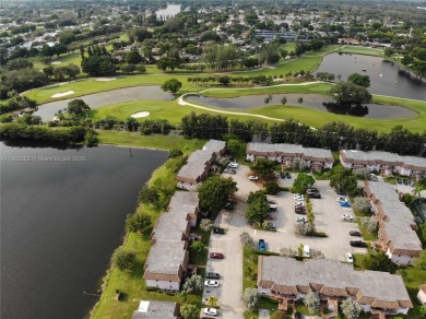 Come view this 2 bedroom 2 bathroom condo in the heart of on Pembroke Lakes Golf Club in Florida - for sale on GolfHomes.com, golf home, golf lot