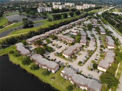 Come view this 2 bedroom 2 bathroom condo in the heart of on Pembroke Lakes Golf Club in Florida - for sale on GolfHomes.com, golf home, golf lot