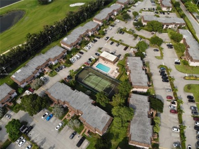 Come view this 2 bedroom 2 bathroom condo in the heart of on Pembroke Lakes Golf Club in Florida - for sale on GolfHomes.com, golf home, golf lot
