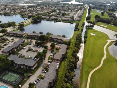 Come view this 2 bedroom 2 bathroom condo in the heart of on Pembroke Lakes Golf Club in Florida - for sale on GolfHomes.com, golf home, golf lot