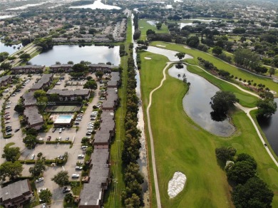 Come view this 2 bedroom 2 bathroom condo in the heart of on Pembroke Lakes Golf Club in Florida - for sale on GolfHomes.com, golf home, golf lot