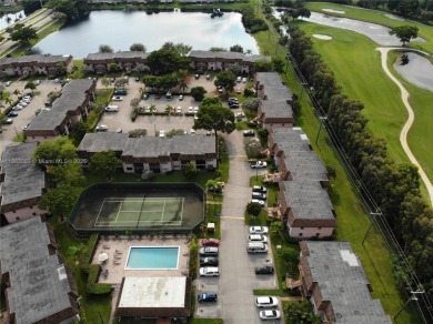 Come view this 2 bedroom 2 bathroom condo in the heart of on Pembroke Lakes Golf Club in Florida - for sale on GolfHomes.com, golf home, golf lot