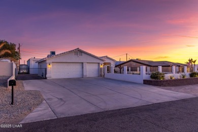 Welcome to 1660 Topaz Dr - A Beautiful 3-Bedroom, 2-Bathroom, Rv on London Bridge Golf Course in Arizona - for sale on GolfHomes.com, golf home, golf lot