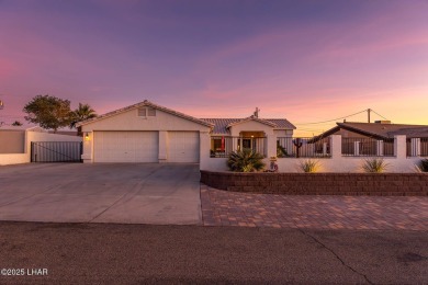 Welcome to 1660 Topaz Dr - A Beautiful 3-Bedroom, 2-Bathroom, Rv on London Bridge Golf Course in Arizona - for sale on GolfHomes.com, golf home, golf lot