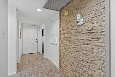 Beautiful Water View 2/2*IMPACT WINDOWS*, Updated Washer & Dryer on Wynmoor Golf Course in Florida - for sale on GolfHomes.com, golf home, golf lot