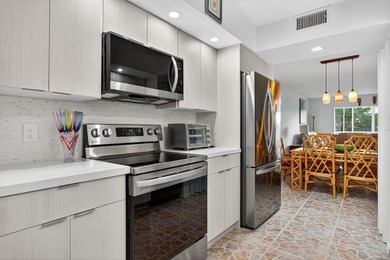 Beautiful Water View 2/2*IMPACT WINDOWS*, Updated Washer & Dryer on Wynmoor Golf Course in Florida - for sale on GolfHomes.com, golf home, golf lot