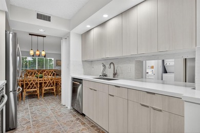 Beautiful Water View 2/2*IMPACT WINDOWS*, Updated Washer & Dryer on Wynmoor Golf Course in Florida - for sale on GolfHomes.com, golf home, golf lot