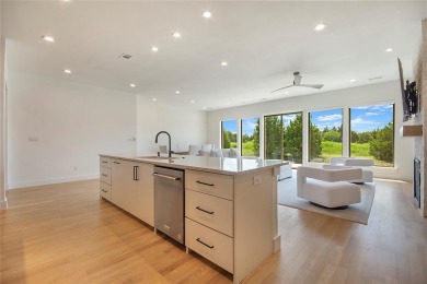 Step inside this stunning two bedroom townhome in Heath Golf and on Heath Golf and Yacht Club in Texas - for sale on GolfHomes.com, golf home, golf lot
